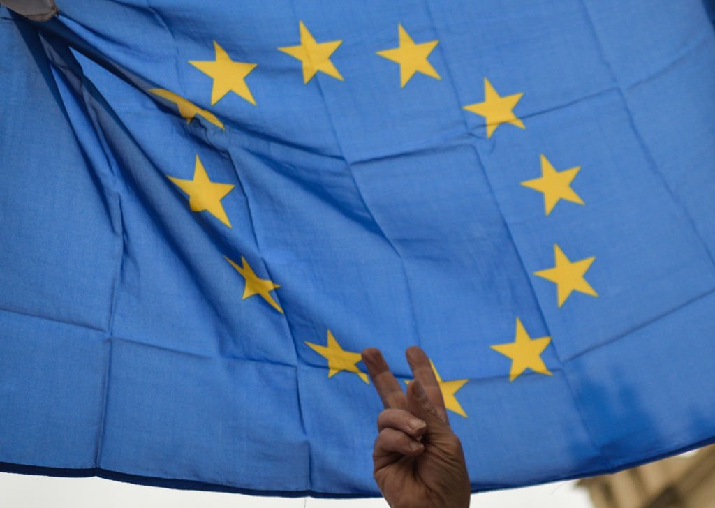 A member of the Committee for the Defence of Democracy (KOD) holds a an EU flag, during the 'Support for Judge Igor Tuley' protest organised in Krakow's Main Market Square on Monday, June 8..Today in Warsaw, the Disciplinary Chamber of the Supreme Court condemned by the European Court of Justice will deal with the prosecutor's request to deprive judge Igor Tuleya of his immunity related to court's activities in 2017. On Tuesday, June 9, 2020, in Krakow, Poland. (Photo by Artur Widak/NurPhoto)